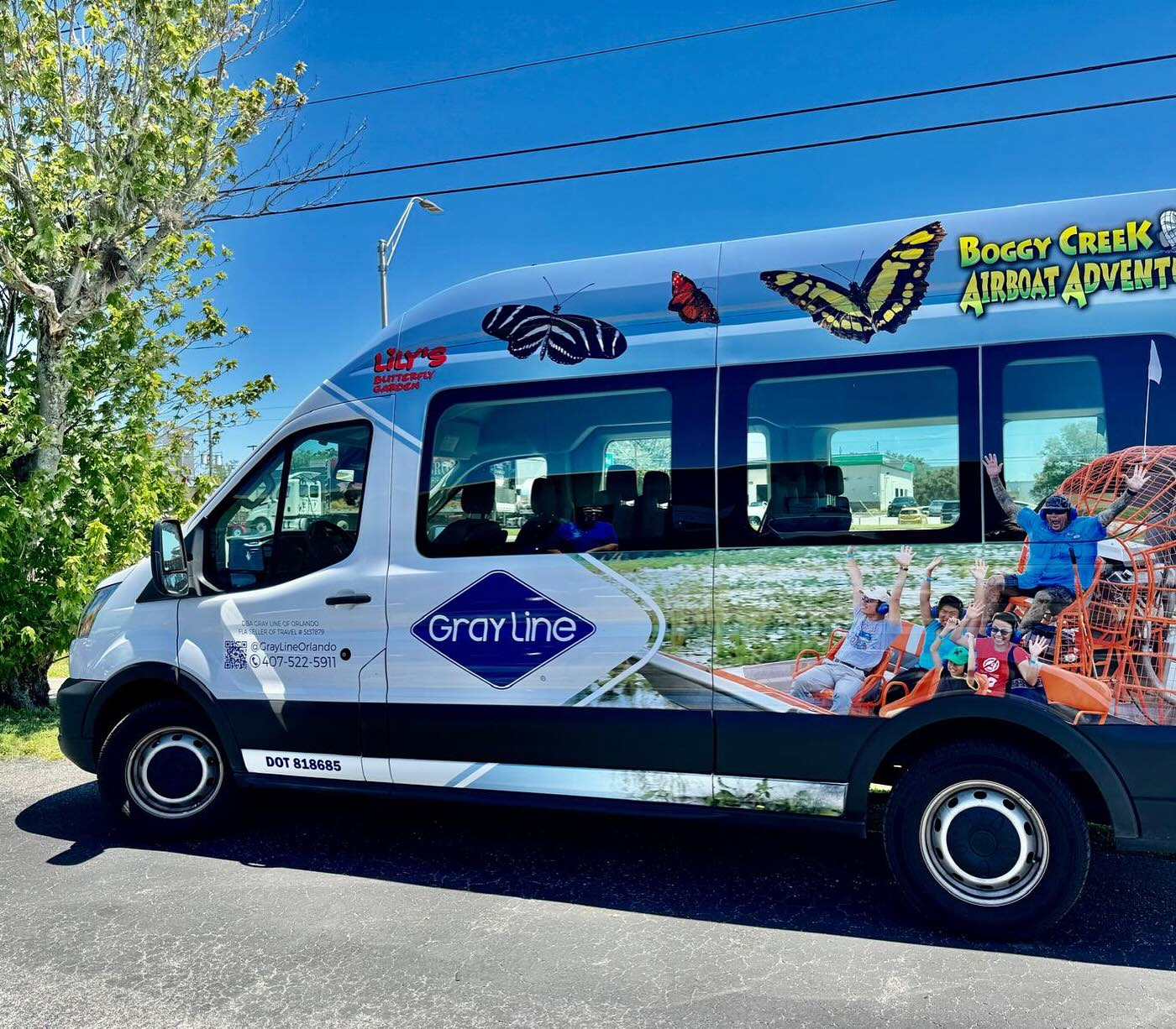 Gray Line Orlando Boggy Creek wrapped tour van Gray Line Orlando Boggy Creek wrapped tour van