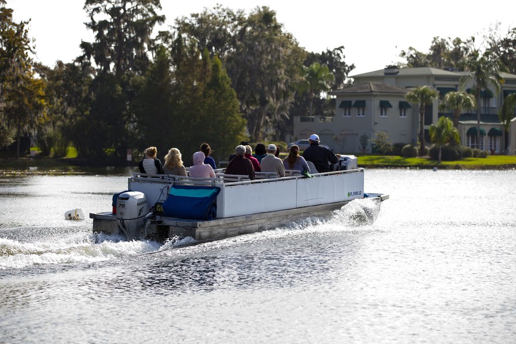 Pontoon boat on winter park chain of lakes cruise
